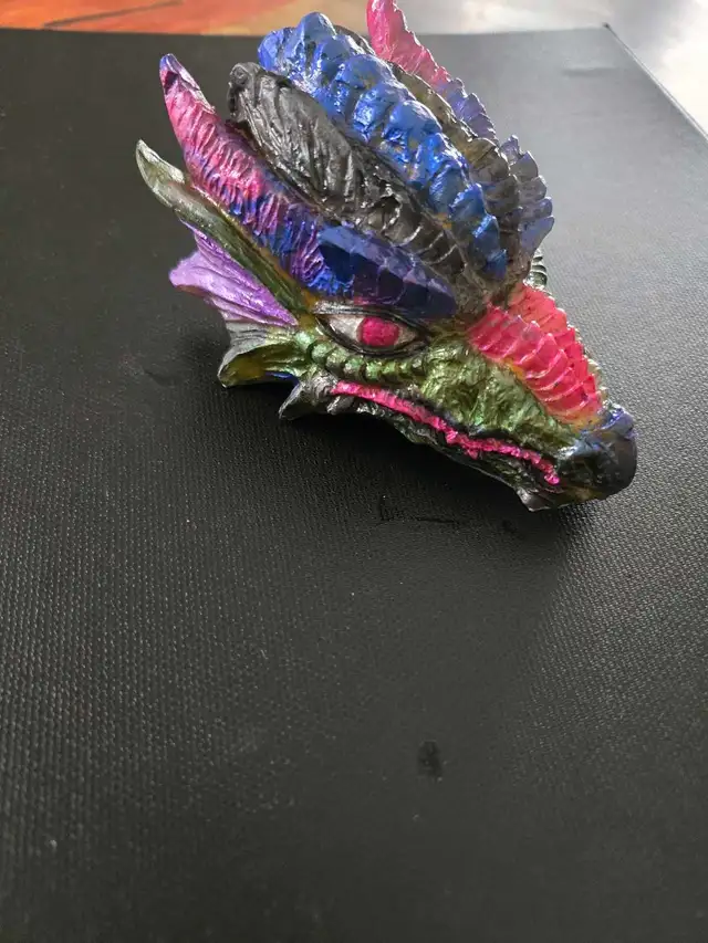 assorted apoxy dragon an skull sculptures - Photo 2