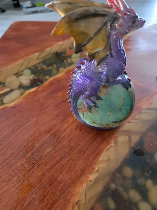 assorted apoxy dragon an skull sculptures - Photo 3