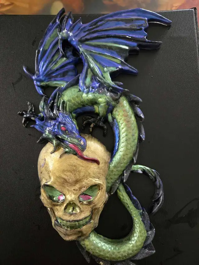 assorted apoxy dragon an skull sculptures - Photo 6