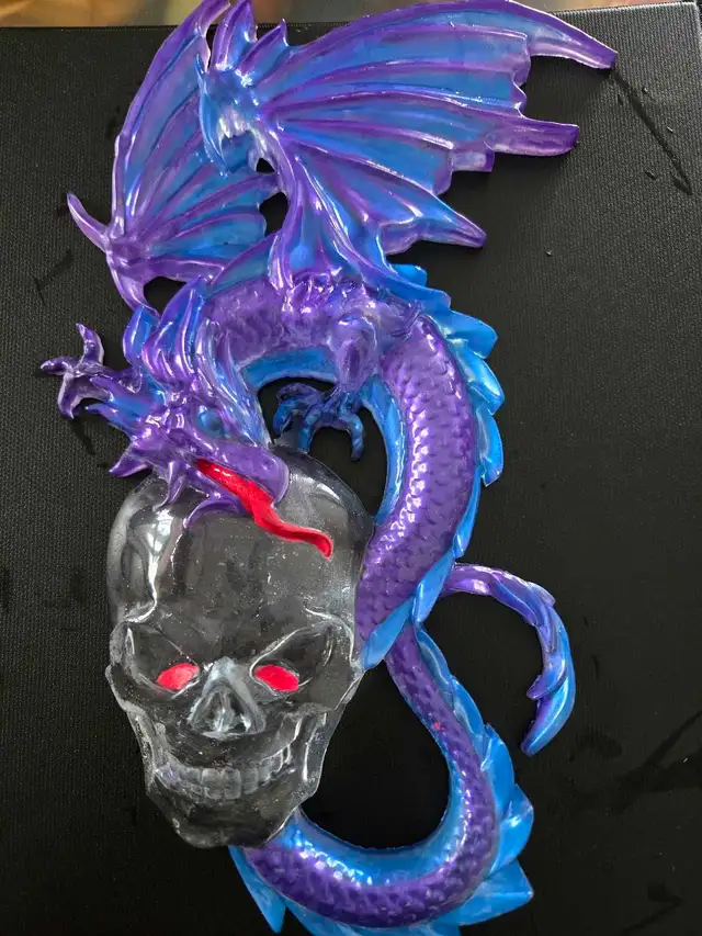 assorted apoxy dragon an skull sculptures - Photo 7