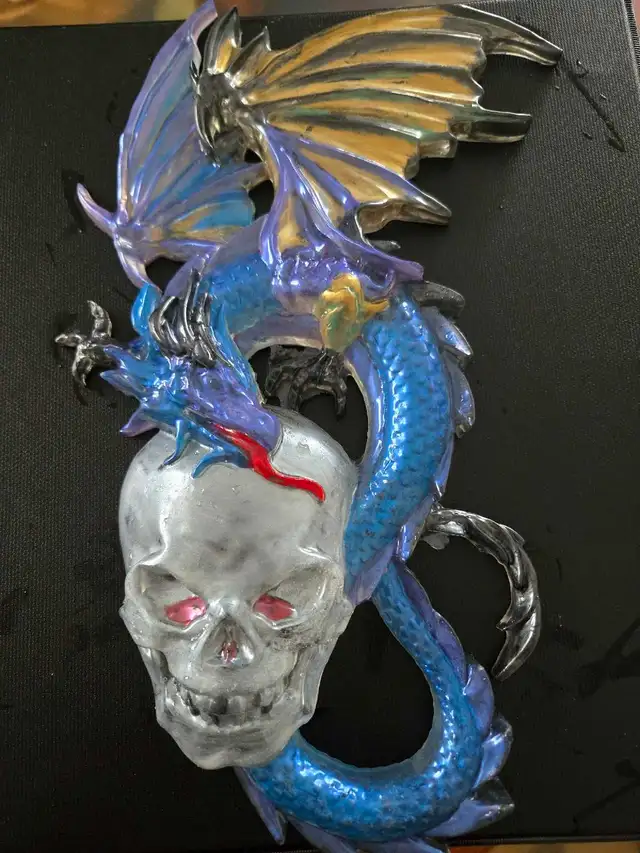 assorted apoxy dragon an skull sculptures - Photo 9