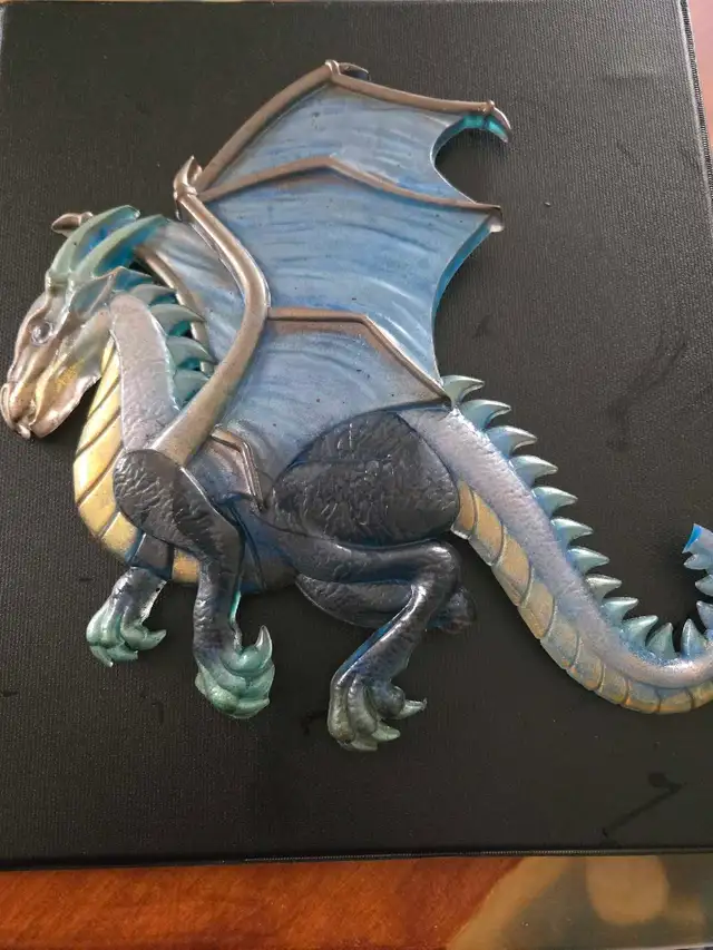 assorted apoxy dragon an skull sculptures - Photo 10