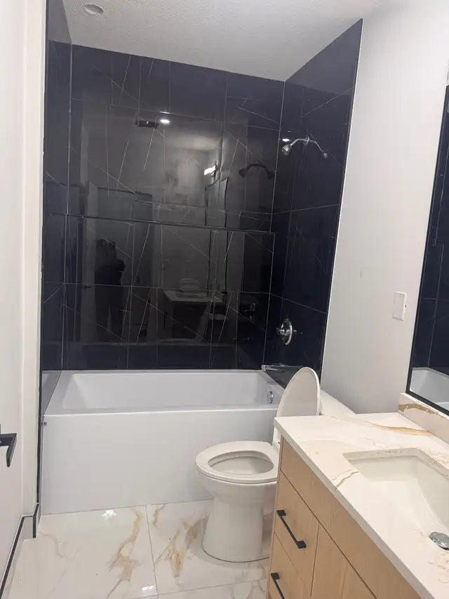 New Basement suite for rent in a new house in Glenridding Ravine - Photo 8