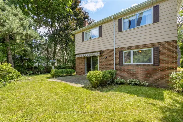 SPACIOUS BACHELOR SUITE – WALK-OUT TO BACKYARD - Photo 2