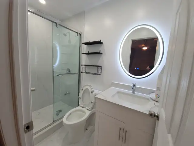 SPACIOUS BACHELOR SUITE – WALK-OUT TO BACKYARD - Photo 6