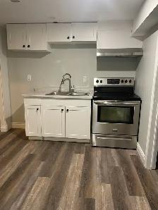 Beautiful 2 bedrooms, 1 bath lower level unit - utility included