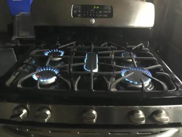 GE Stainless Steel 30 INCH PROPANE GAS STOVE $525 - Photo 2