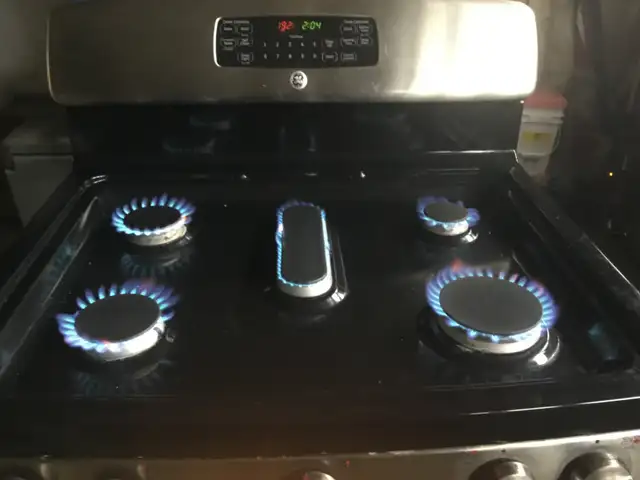 GE Stainless Steel 30 INCH PROPANE GAS STOVE $525 - Photo 3