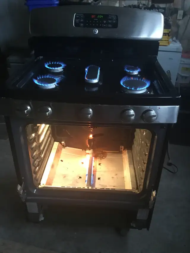GE Stainless Steel 30 INCH PROPANE GAS STOVE $525 - Photo 4