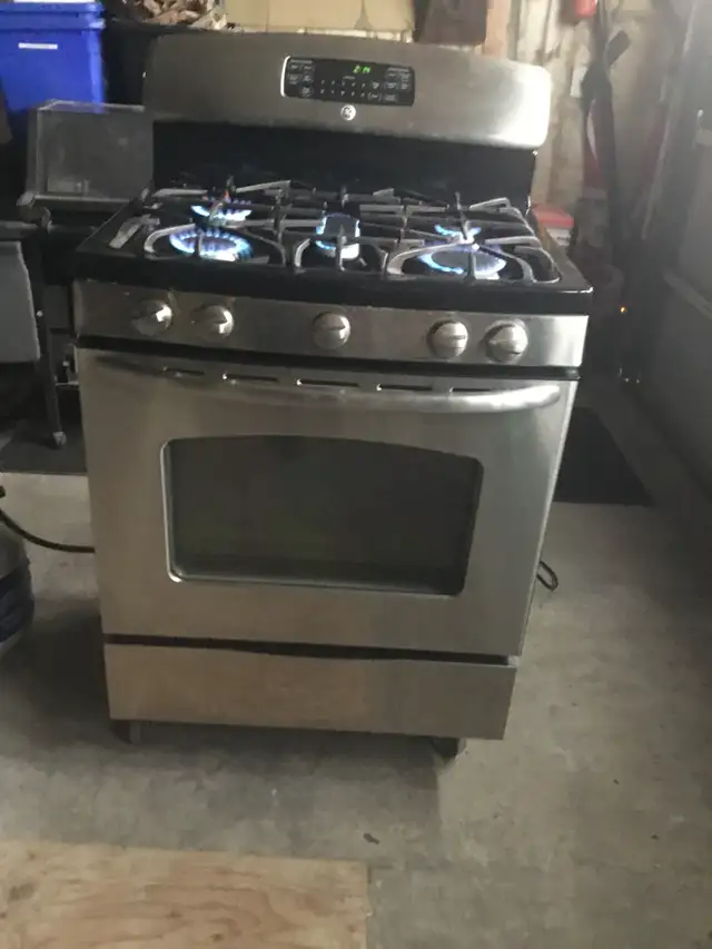GE Stainless Steel 30 INCH PROPANE GAS STOVE $525 - Photo 5