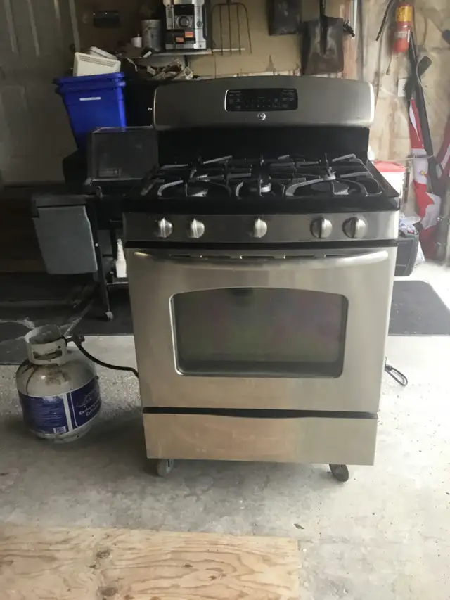 GE Stainless Steel 30 INCH PROPANE GAS STOVE $525 - Photo 7