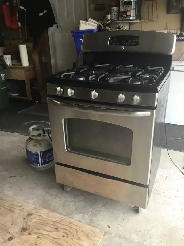 GE Stainless Steel 30 INCH PROPANE GAS STOVE $525 - Photo 8