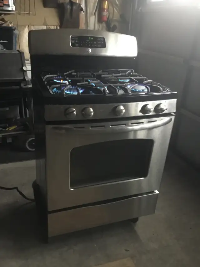 GE Stainless Steel 30 INCH PROPANE GAS STOVE $525 - Photo 10