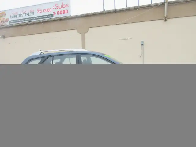 2011 Kia Rondo EX - Photo 5