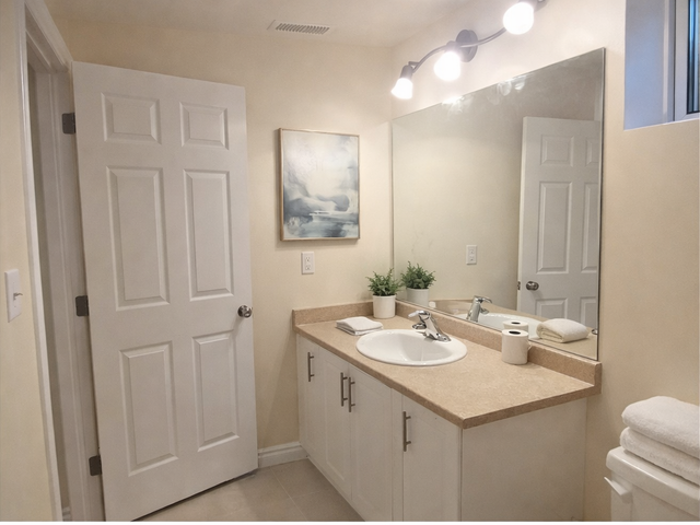 HUGE 2 BEDROOM LOWER LEVEL APT - UTILITIES INCLUDED - WEST BRANT - Photo 6