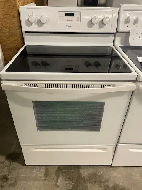 Cuisinière blanche vitrocéramique Whirlpool