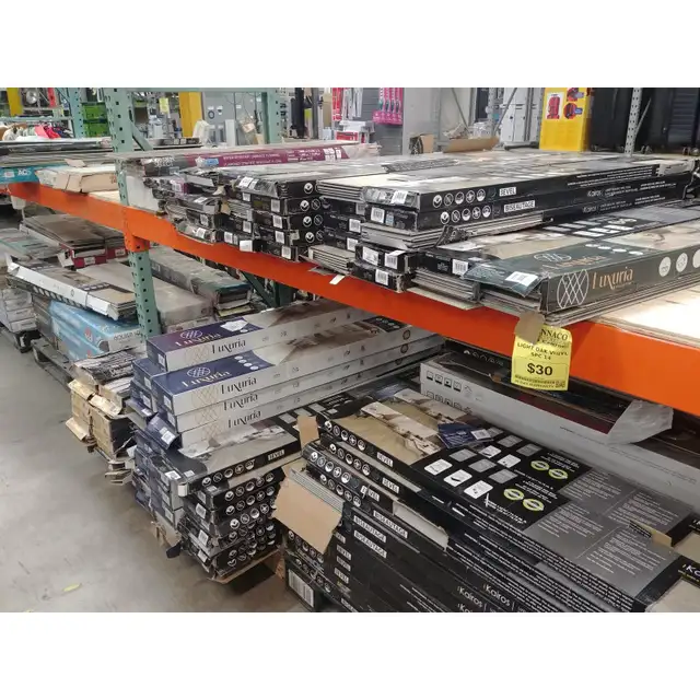 Assorted discontinued laminate flooring, various styles and colo