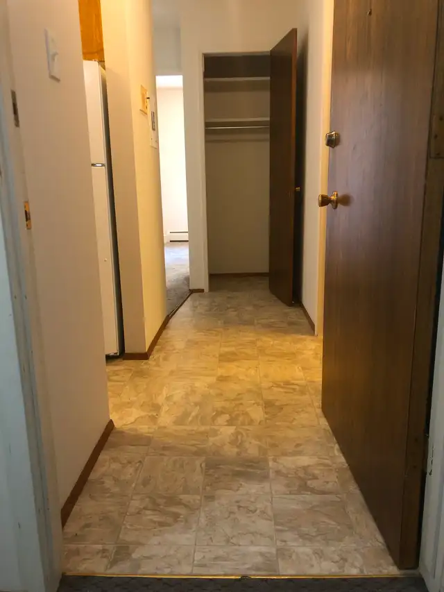 1 Bedroom Suite - ALL Utilities Included - Great Location - Photo 2