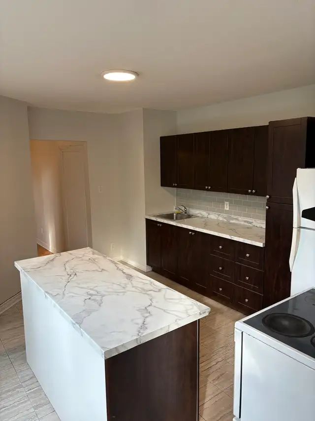 3 Bedroom  Den 7 1/2 ….HEATING INCLUDED