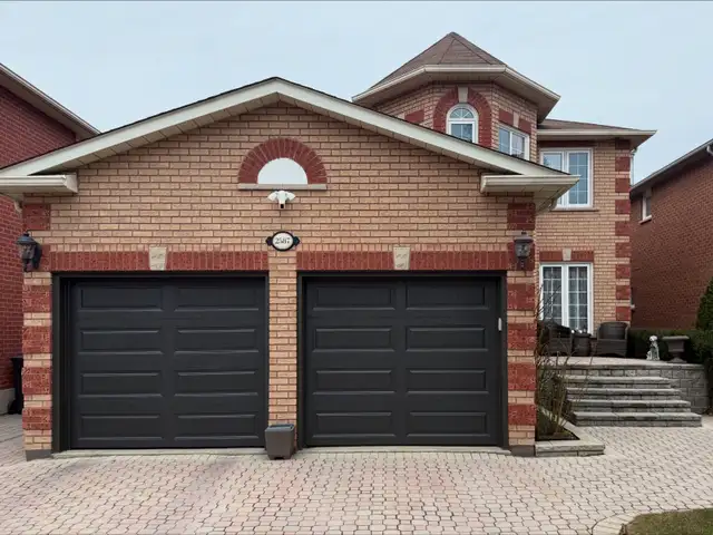 Upgrade your home with a classic Raised Panel Garage Door - Photo 2