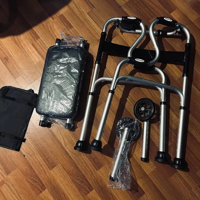 ONE NEW IN THE BOX WHEELED OR SKID /SEAT ON WALKERAS PICTURED