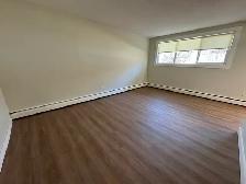 Updated 1 Bed Suite | Pet Friendly | In-Suite Laundry - Photo 5
