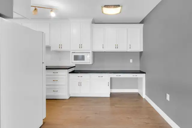 PRICE DROP! UPDATED 2 BED SUNALTA DOWNTOWN CONDO FOR SALE - Photo 8