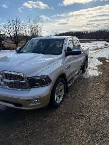 Selling my 2012 ram 1500 Laramie longhorn asking $24000