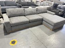 Grey fabric sectional with oversized chaise- demo