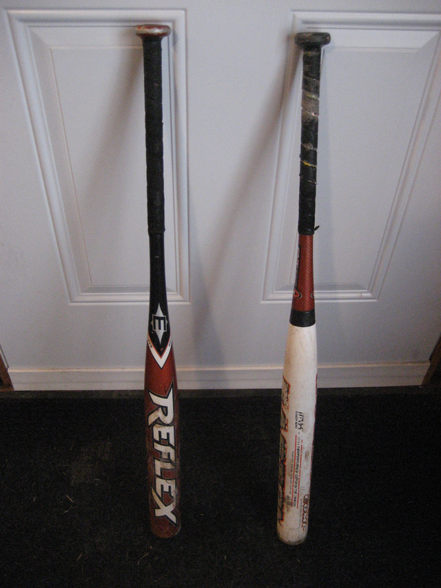 2 Easton aluminum softball bats