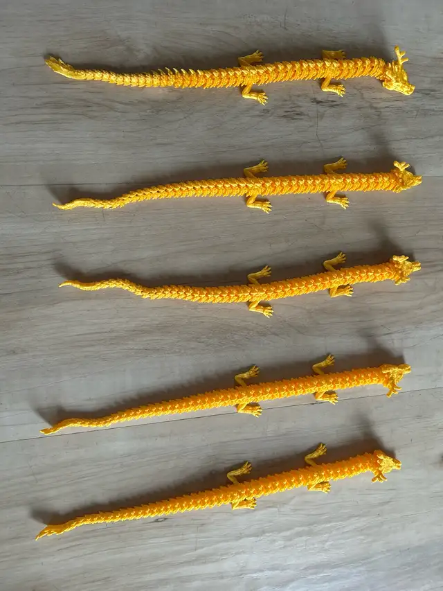 3D printed yellow dragons