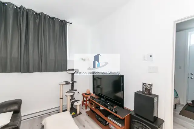 Appartement à Louer - 97 rue Marguerite-Maillé #101 - Photo 4