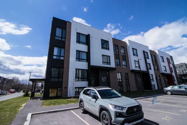 Appartement à Louer - 97 rue Marguerite-Maillé #401 - Photo 2