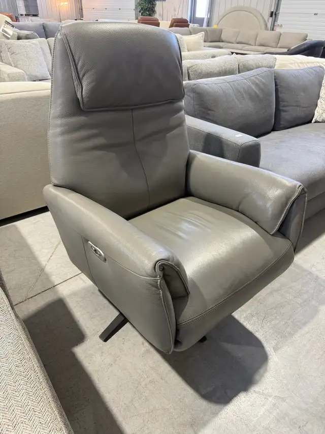 Grey leather swivel power recliner