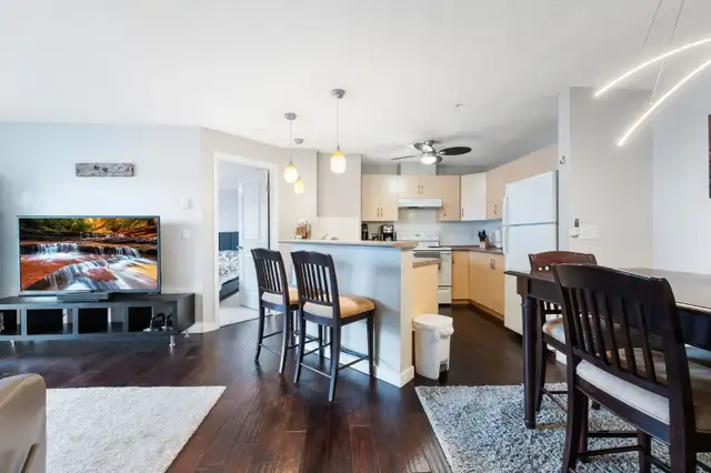 Beautifully bright condo located in the heart of Cochrane - Photo 2