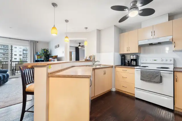 Beautifully bright condo located in the heart of Cochrane - Photo 3