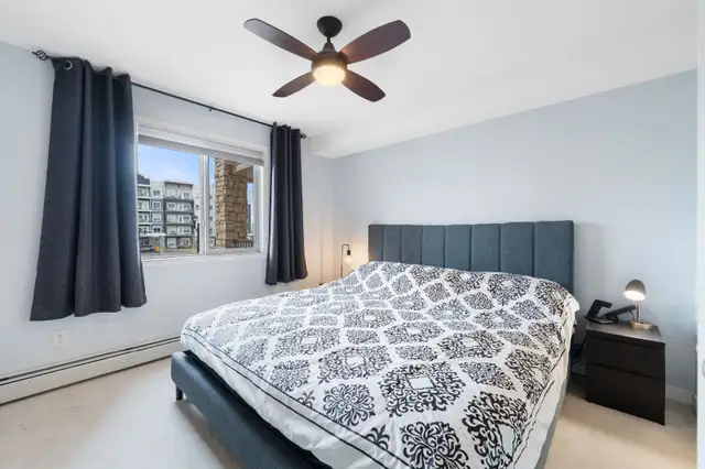 Beautifully bright condo located in the heart of Cochrane - Photo 5