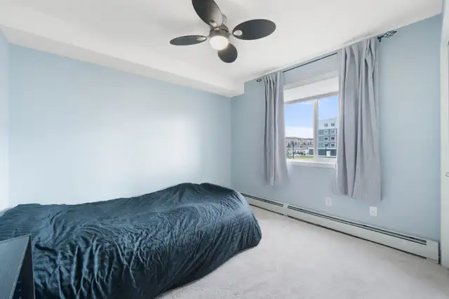 Beautifully bright condo located in the heart of Cochrane - Photo 8