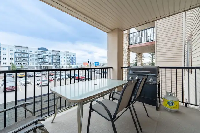 Beautifully bright condo located in the heart of Cochrane - Photo 9
