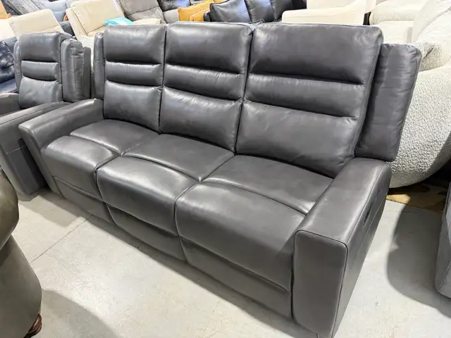 Grey leather manual reclining sofa