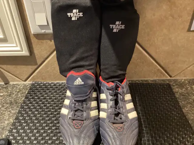 Adidas soccer cleats with shinguards