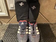 Adidas soccer cleats with shinguards