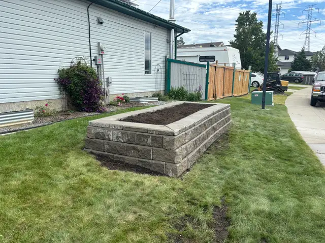 landscaping and fence - Photo 8