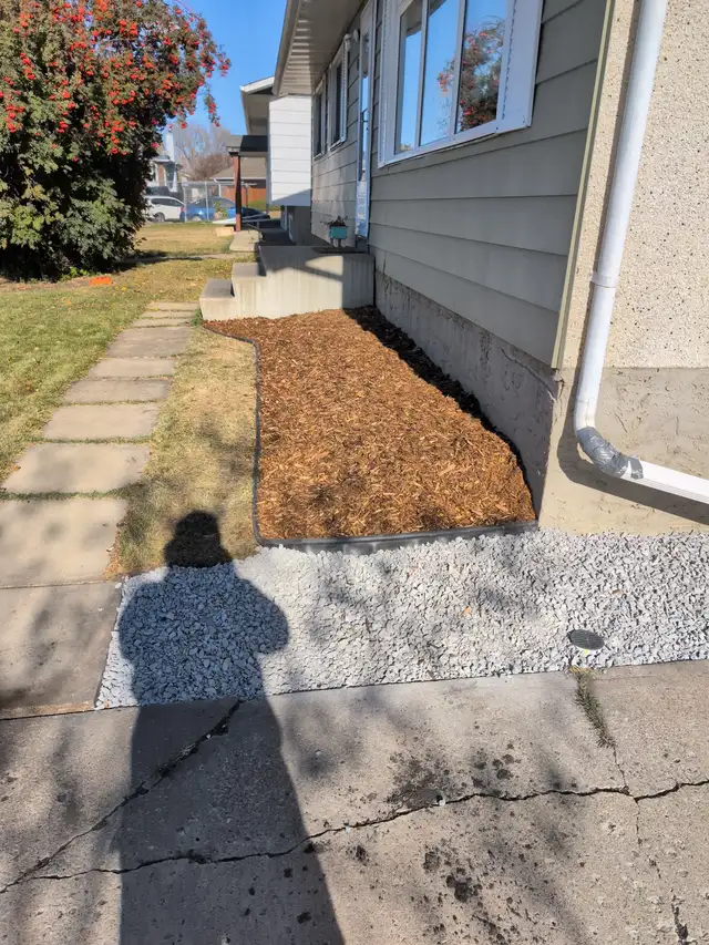 landscaping and fence - Photo 10