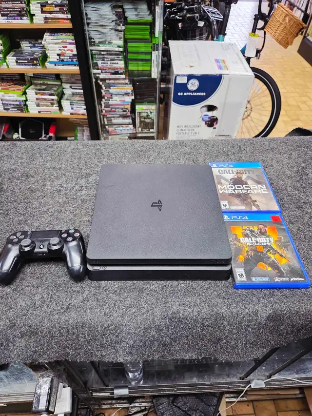 PS4 slim 500GB digital   3 jeux