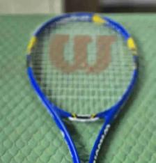 professional Wilson tennis racquet.Hardly used.