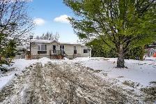 TERREBONNE ! BAISSE DE PRIX! BUNGALOW 5 CAC ET TERRAIN 44708PC !