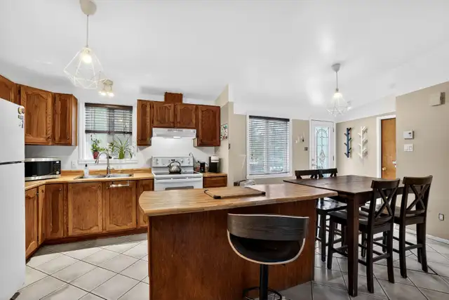 TERREBONNE ! BAISSE DE PRIX! BUNGALOW 5 CAC ET TERRAIN 44708PC ! - Photo 2