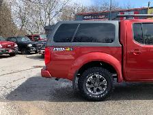 Nissan Frontier bed cap Leer