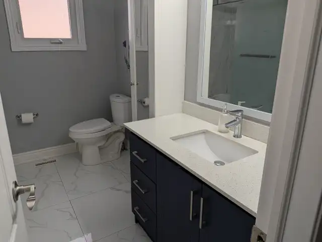 RENT 3 bedroom with 1 ½ bath Main floor. 2 parking - Photo 5